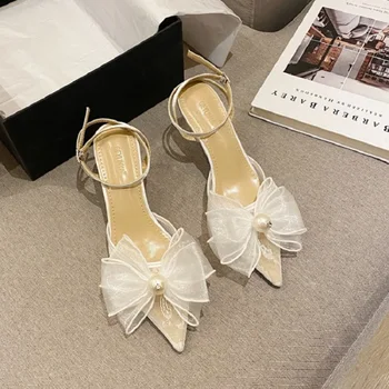 Pavasarī un vasarā jaunā baltā mežģīņu līgavas kāzu kurpes acu loku norādīja sandales augstpapēžu kurpes kleitas ikdienas visas spēles sieviešu kurpes
